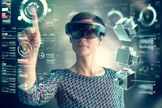 Woman wearing mixed reality smartglasses touching transparent screen.